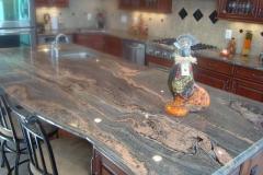 Exotic stone with dynamic movement and Ogee edge.