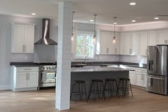 River Blue hard marble island with MSI Q Quartz Mirano Gray for the perimeter in Piney Point, MD