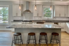 River Blue hard marble island with MSI Q Quartz Mirano Gray for the perimeter in Piney Point, MD