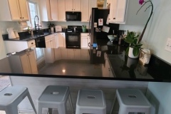 Absolute Black granite peninsula with 18" overhang for seating in LaPlata, MD.