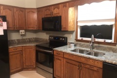 Fantasy Brown kitchen with backsplash.