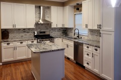 Kitchen with island in Viscont White granite. Southern MD remodel.