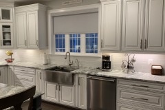 Fantasy Brown kitchen with apron front farm sink in Harwood, MD