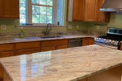 Sequoia Brown kitchen with island in Southern Maryland home.