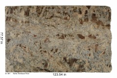 Bordeaux River granite. Warm toned, lots of reds and cream colors with interesting movement and bits of mica throughout. Looks great with neutral colors and warm tones.  Low price range.