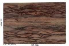Red Colinas granite.  Spanish for red hills, you can see how it got it's name.  A peach colored bedrock with reds and purples flowing into each other so perfectly you would think someone painted this slab..  White or cherry cabinets compliment this stone the best.  Consignment price.