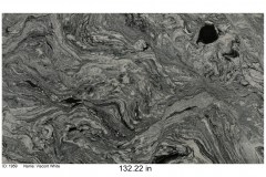 Viscont White granite.  A white stone with black and grey swirled veining. The veining gives this stone movement that mimics the look of marble but provides all of durability of granite. Looks great on white or black cabinets.  Low price range.