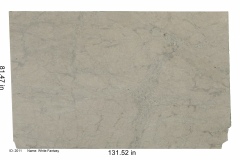 White Fantasy granite. A very subtle look for granite, it's beige with a pale blue veining and small pops of color quartz deposits.  Mid-range price.
